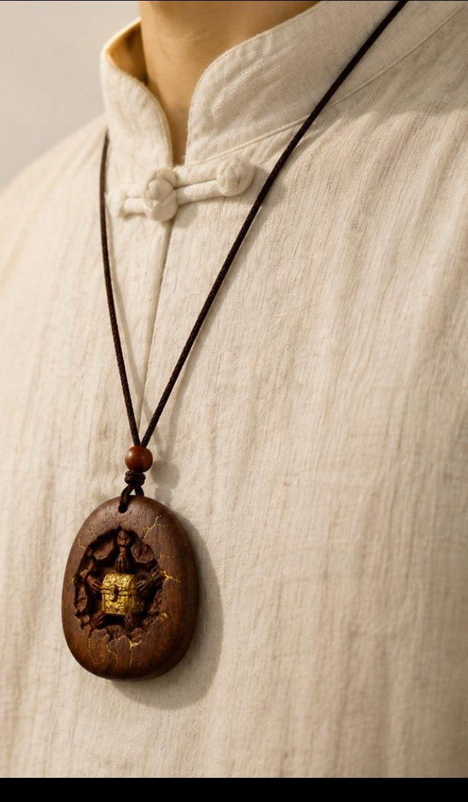 Braided cord necklace with thunder-struck wood carving