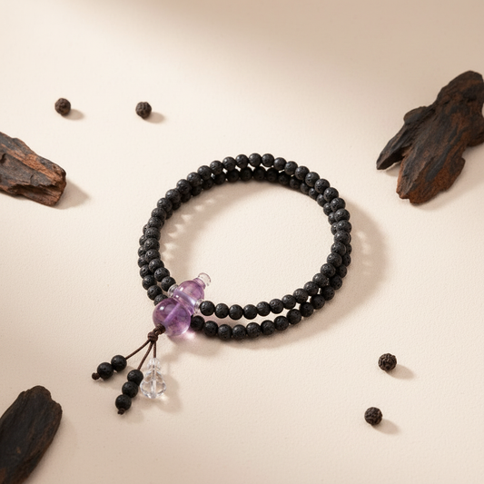 Five Elements Black incense bead necklace warm white background with agarwood resin decoration